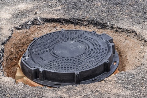 CAST IRON MANHOLE COVERS